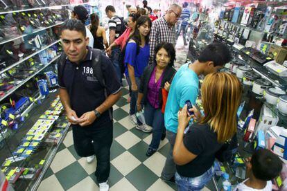 Venezuelans take to the stores on Wednesday.