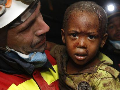 Rescue Redjeson Hausteen Claude, a two-year-old Haitian boy who was buried under rubble.