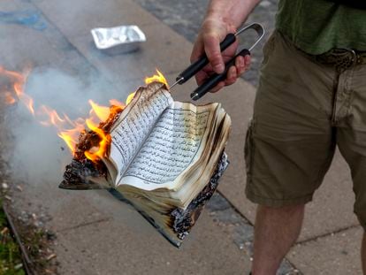 A Quran is burned by an activist from the small right-wing group, Danish Activists, on July 28, 2023 in Copenhagen, Denmark.