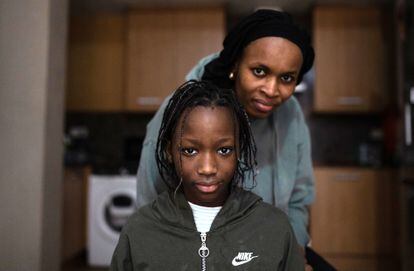 Diama Ndiaye, 11, already cured of her sickle cell disease, with her mother, Oulimata Ndiaye, 33, at their home in Terrassa, Barcelona.
