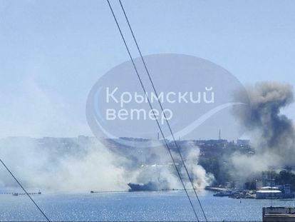 This image taken from UGC video shows smoke rising from the headquarters of Russia’s Black Sea Fleet in Sevastopol, Crimea.