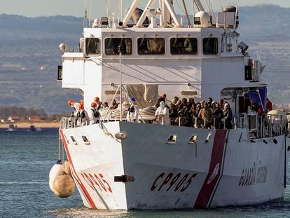 The Italian coast guard ship Peluso enters the Sicilian harbor of Catania, Italy, on April 17, 2023, with some 300 migrants saved from the sea.