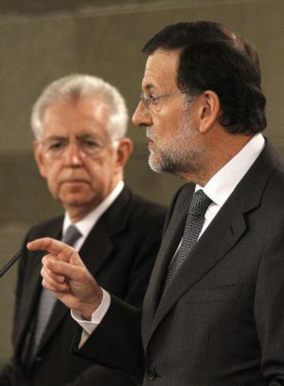 Rajoy and Monti during a press conference in Madrid on Monday.