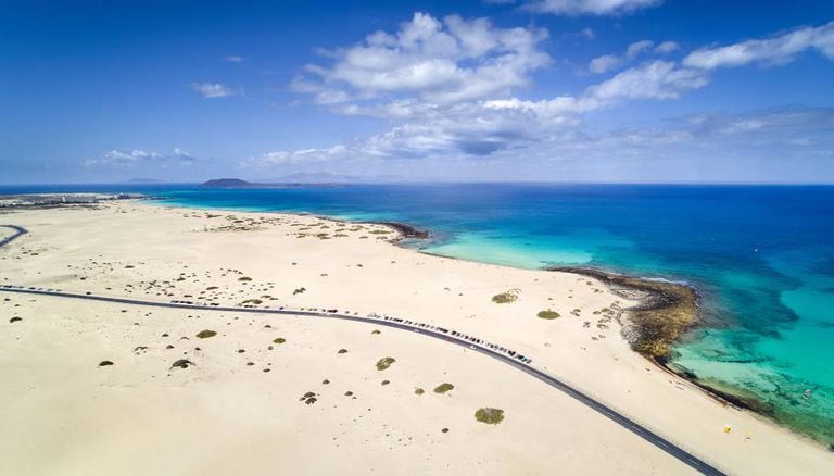 Aerial view of the road to the beaches of the Corralejo Dunes National Park.