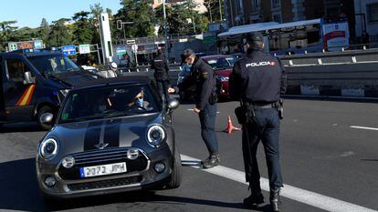 Police check in Madrid on Saturday.