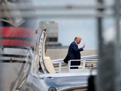 Republican presidential candidate and former president Donald Trump arrives at the Miami International Airport on June 12, 2023, in Miami, Florida.