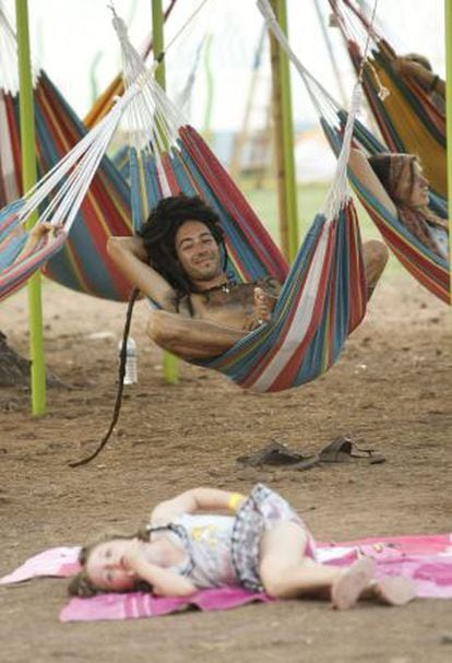 A festivalgoer at this year&rsquo;s Rototom festival relaxes on a hammock. 
