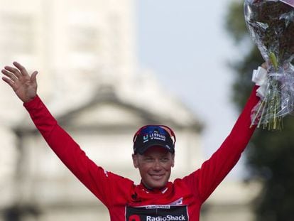 RadioShack&#039;s US rider Chris Horner celebrates on the podium after winning the &quot;Vuelta&quot; Tour of Spain in Madrid on September 15.