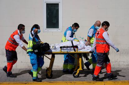 A patient is transferred at the 12 de Octubre hospital in Madrid