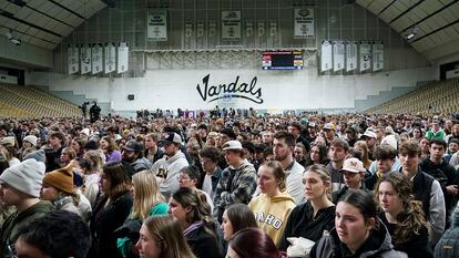 Hundreds of people gather at a vigil for the four victims at the University of Idaho's Kibbie Dome on November 30.
