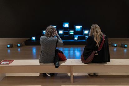 Two women admire the artwork titled 'Quindío Way' by Colombian artist José Alejandro Restrepo at MoMA. 