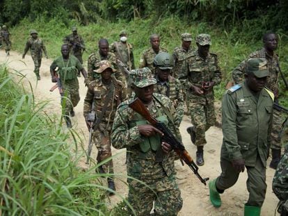 Soldiers carry out a joint military operation between Uganda and the DRC against ADF forces in Beni territory, northeastern Democratic Republic of the Congo (DRC), on Dec. 8, 2021.