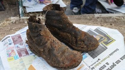 Boots that once belonged to Perfecto de Dios, whose remains were exhumed thanks to funding from a Norwegian union.