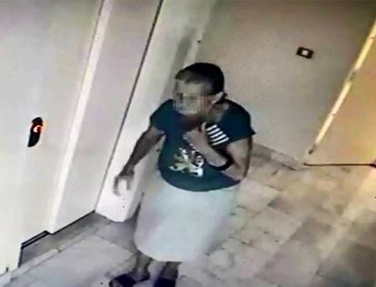 Security camera footage of the elderly woman in one of the apartments she stole from.