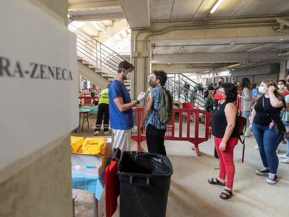 A second shot of AstraZeneca is administered in a sports stadium in Murcia, southern Spain.