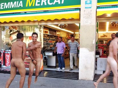Three Italian tourists running around naked in Barceloneta on Friday.