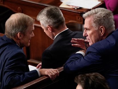 Congressman Jim Jordan (left) talks with former Speaker of the House of Representatives, Kevin McCarthy, on Tuesday in the chamber.