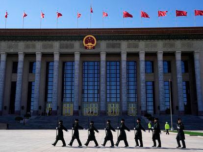 Chinese soldiers paraded in front of the Great Hall of the People in Beijing on Saturday.