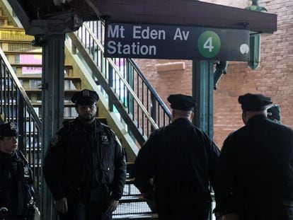 Police officers investigate a shooting at a subway station in the Bronx on February 12.
