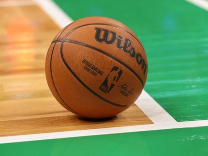 The official ball of the NBA, on the court of the Boston Celtics.