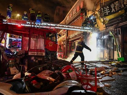 Firefighters work at the site of an explosion at a restaurant in Yinchuan, northwest China's Ningxia Hui Autonomous Region, on June 21, 2023.