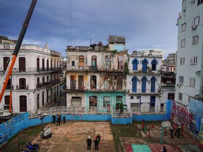 Emergency services work on the site where a residential building collapsed in Havana, Cuba, October 4, 2023.