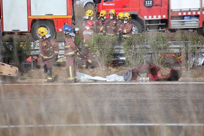 Firefighters at the scene of the Tarragona bus crash on Sunday.