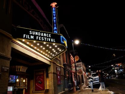 Pedestrians take photos of the marquee of the Egyptian Theatre before the 2023 Sundance Film Festival, Wednesday, Jan. 18, 2023, in Park City, Utah. The annual independent film festival runs from Jan. 19-29.
