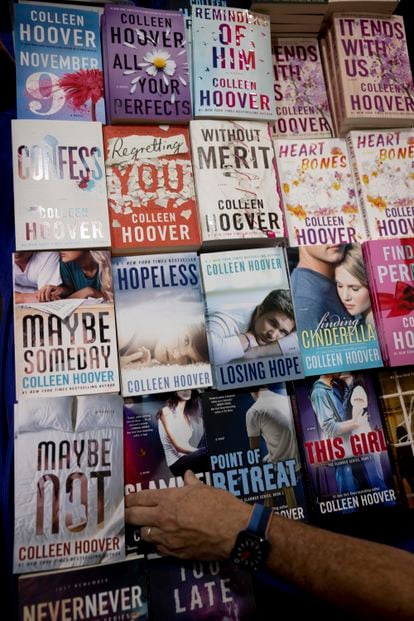 Some of Colleen Hoover's bestselling books on display at the Grapevine Book Fair in Texas.
