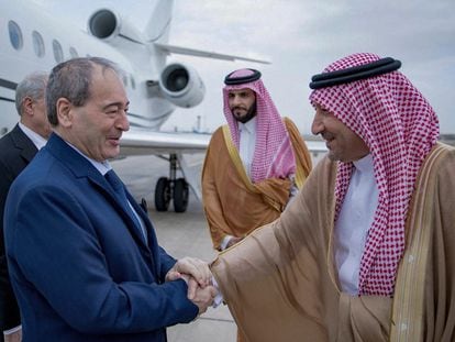 Saudi Deputy Foreign Minister Walid al-Khuraiji receiving Syrian Foreign Minister Faisal Mekdad upon his arrival at the airport of Jeddah on April 12, 2023.
