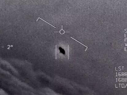 In an image from a 2015 Department of Defense video, an object is seen rising through the clouds, traveling against the wind.