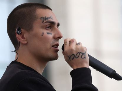 Russian rapper FACE (Ivan Dryomin), sings during a demonstration in Moscow in 2019.