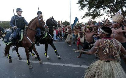 Indigenous protestors clash with police in Brasilia.