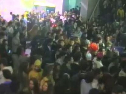 A still image from a security camera at Madrid Arena shows a large number of people trying to access the dance floor via a narrow corridor. 