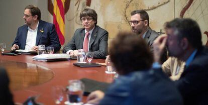 Catalan Premier Carles Puigdemont and Deputy Premier Oriol Junqueras (left) during a weekly meeting.