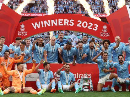 Manchester City players celebrate winning the English FA Cup final football match between Manchester City and Manchester United at Wembley stadium, in London, on June 3, 2023.