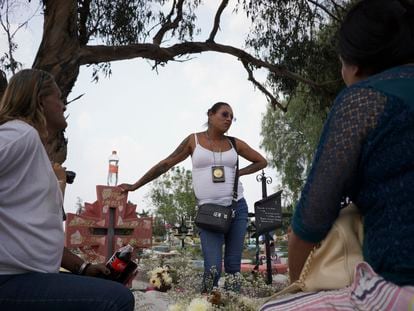 Kenya Cuevas and friends at the grave of Paola, the trans woman whose murder triggered Cuevas' activism