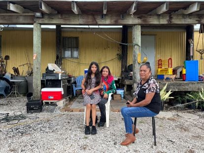 From right to left: Antonia Catalán, her daughter Gabriela Ibarra and her granddaughter Kathy Camacho. They are pictured in the garden of their home in Redland, Florida, on July 21, 2023.