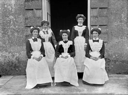 Servants at Biddlesden Park House, Buckinghamshire, in a photo taken between 1896 and1920.
