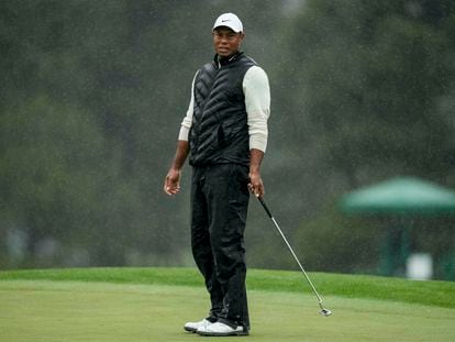 Tiger Woods reacts after missing a putt on the 18th hole during the weather delayed second round of the Masters golf tournament at Augusta National Golf Club on Saturday, April 8, 2023.