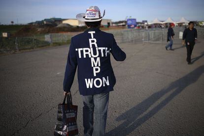 A supporter attends a Trump rally at Arnold Palmer Regional Airport in Latrobe, Pennsylvania.