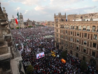 Supporters watch Mexico's President Andres Manuel Lopez Obrador on a screen as he delivers a speech during an event to mark the 85th anniversary of the expropriation of foreign oil firms, at the Zocalo square, in Mexico City, Mexico March 18, 2023.