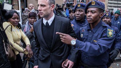 South African Paralympian Oscar Pistorius leaves the high court in Pretoria, on June 14, 2016.