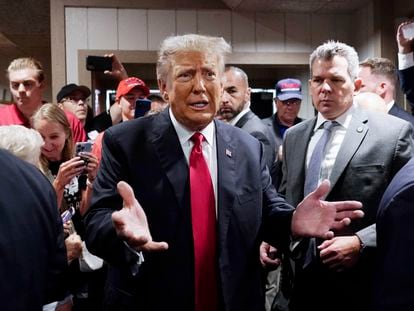 Former President Donald Trump greets supporters before speaking at the Westside Conservative Breakfast, Thursday, June 1, 2023, in Des Moines, Iowa.