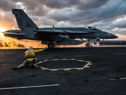 An F/A-18E Super Hornet fighter takes off from the US Navy carrier USS Ronald Reagan in the Pacific.