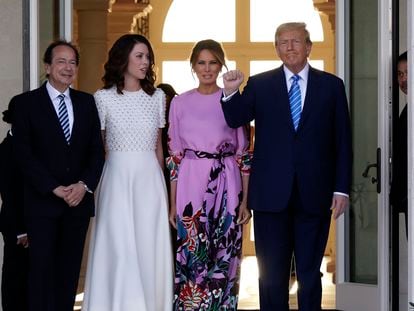 John Paulson and his partner Alina de Almeida receive Donald Trump and his wife Melania at their home in Palm Beach, Florida, on April 6, 2024.