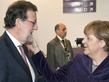 Mariano Rajoy and German chancellor Angela Merkel in December.