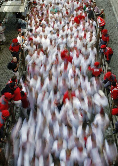 Runners in motion during the first Running of the Bulls in 2008.