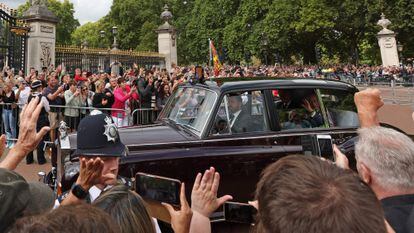 After being proclaimed king on Saturday, Charles III waves to the crowd gathered at the gates of Buckingham Palace as he arrived at the official residence. 