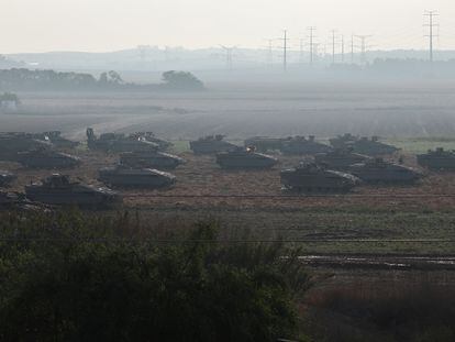 Israeli tanks and armored vehicles deployed near the Gaza Strip.